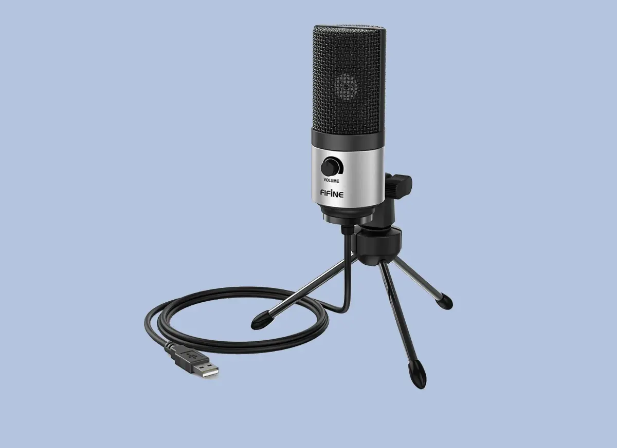 A USB microphone on a tripod stand, featuring a volume control knob and a connected USB cable, set against a light blue background.